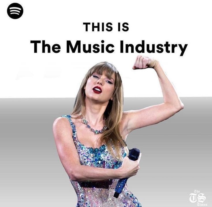 a woman holding a microphone in her right hand with the words, this is the music industry