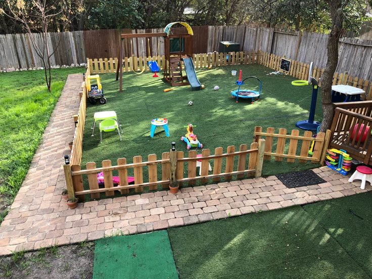 an outdoor play area in the backyard