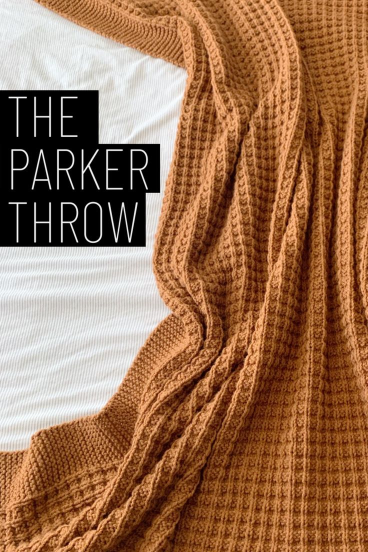 the blanket throw is laying on top of an unmade bed with text overlay that reads, the parker throw