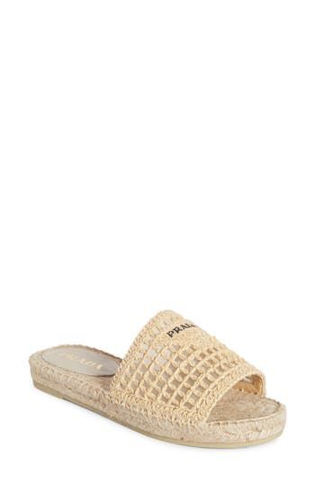 Cruise into warm weather in this easygoing espadrille slide sandal with a breezy mesh-and-crocheted-raffia upper paired with a braided-jute footbed. Textile upper and lining/synthetic sole Made in Italy Designer Shoes Vacation Woven Leather Slip-on Espadrilles, Casual Woven Leather Espadrilles With Round Toe, Beige Woven Leather Espadrilles For Spring, Spring Beige Woven Leather Espadrilles, Designer Woven Leather Sandals For Spring, Casual Leather Espadrilles With Woven Detail, Casual Woven Leather Espadrilles, Casual Beige Espadrilles With Woven Leather, Casual Beige Woven Leather Espadrilles