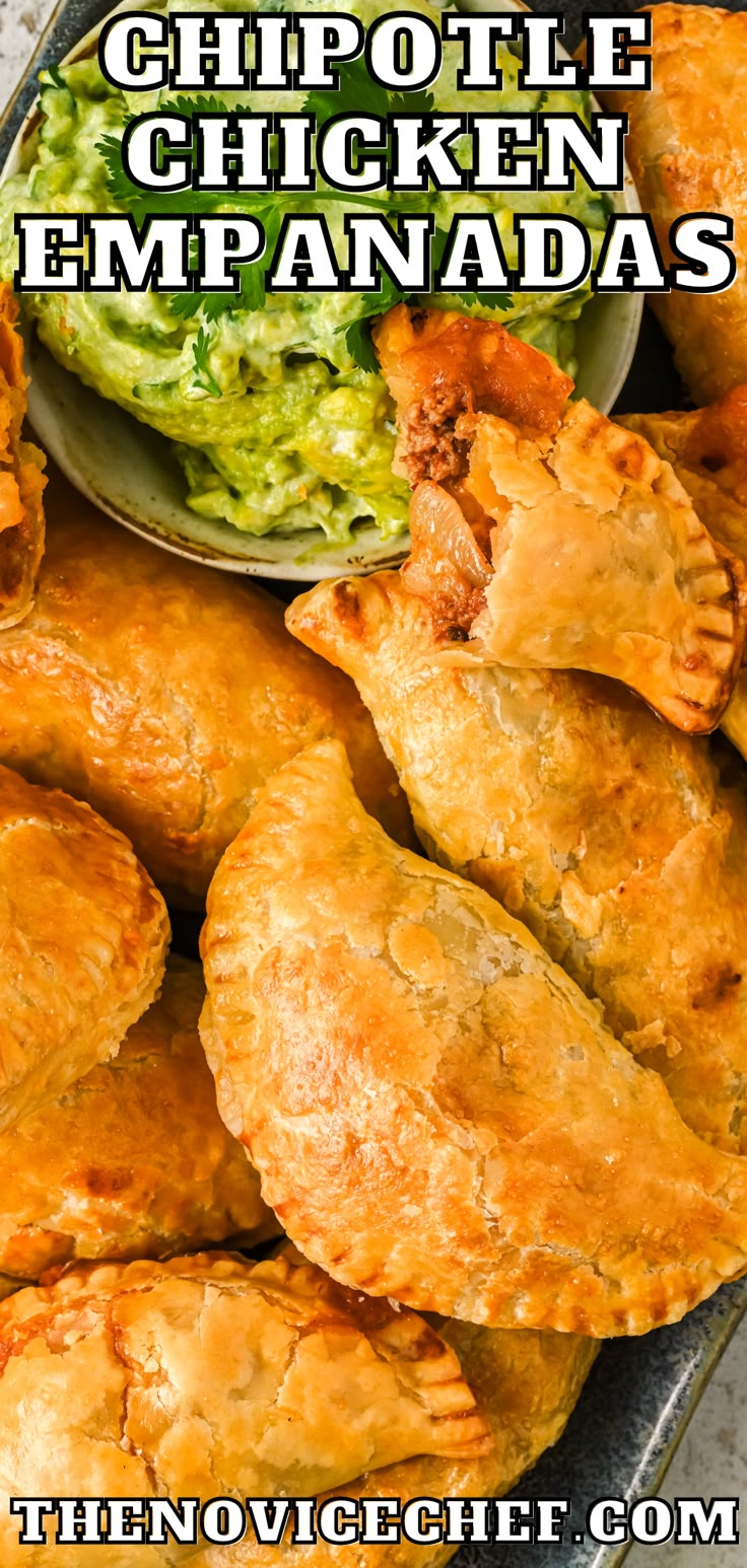 chicken empanadas with guacamole and salsa on the side in a bowl