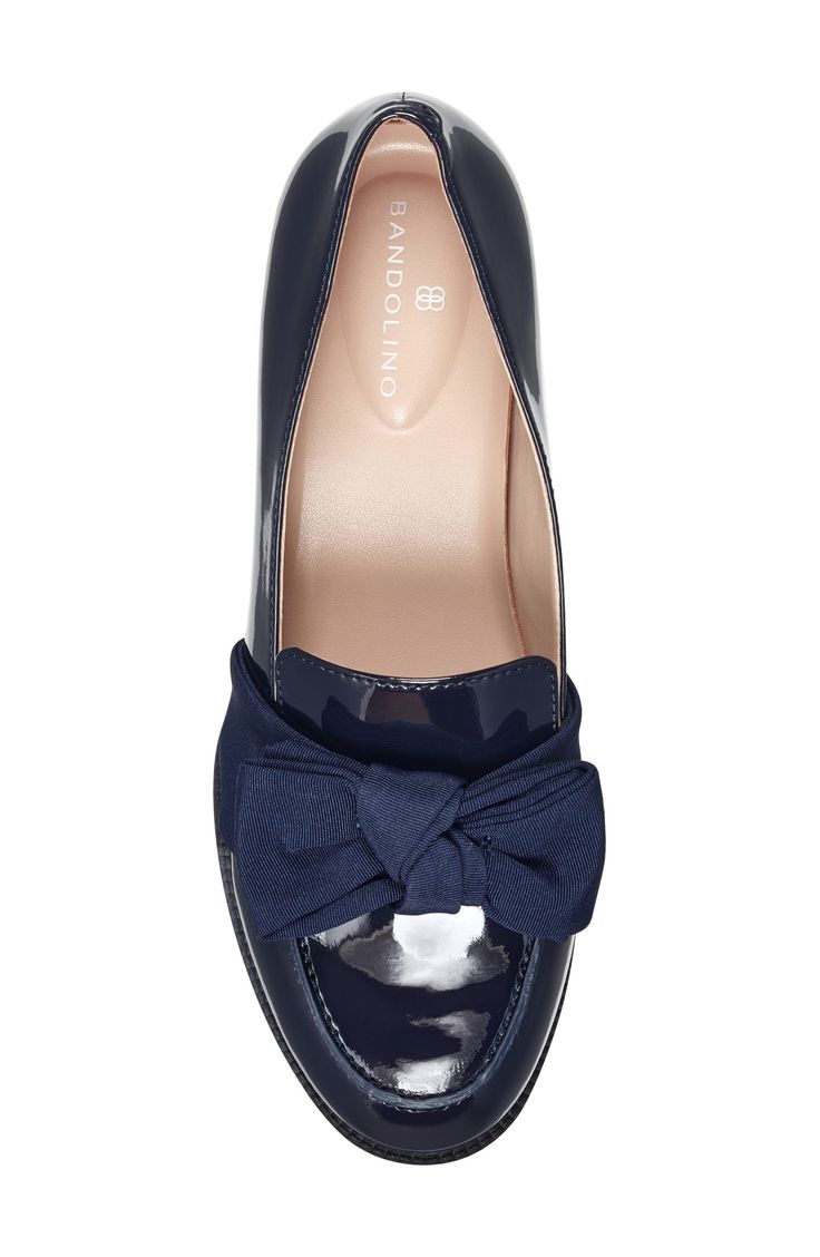 A grosgrain ribbon bow enriches a polished loafer lifted by a stacked block heel. 3/4" heel Synthetic and textile upper/synthetic lining and sole Imported Formal Slip-on Heels With Bow, Formal Synthetic Heels With Bow, Formal Patent Leather Heels With Bow, Formal Bow Patent Leather Heels, Classic Office Heels With Bow Detail, Formal Slip-on Loafers With Bow, Almond Toe Heels With Bow For Work, Spring Patent Leather Loafers With Low Heel, Classic Bow Loafers For Formal Occasions