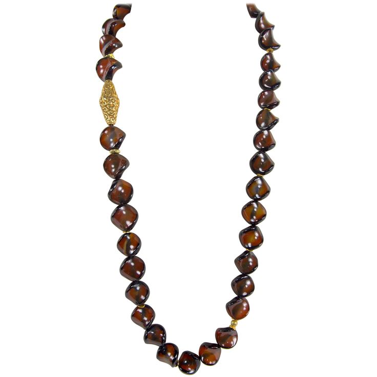 Stunning and Unique Large ‘Thump Grip’ Carnelian and Gold bead Runway Necklace. Approx. length of necklace 32 inches; enhanced an embossed tubular shaped gilt brass bead; approx. 42.5mm long x 17mm wide; 38 Carnelian beads; each approx. 22mm in diameter. Beautiful and Chic …Illuminating your Look with a touch of Class! Runway Necklace, Keshi Pearl Necklace, Carnelian Beads, Beaded Statement Necklace, Evil Eye Pendant, Keshi Pearls, Faux Pearl Necklace, Pearl Choker, Multi Strand Necklace