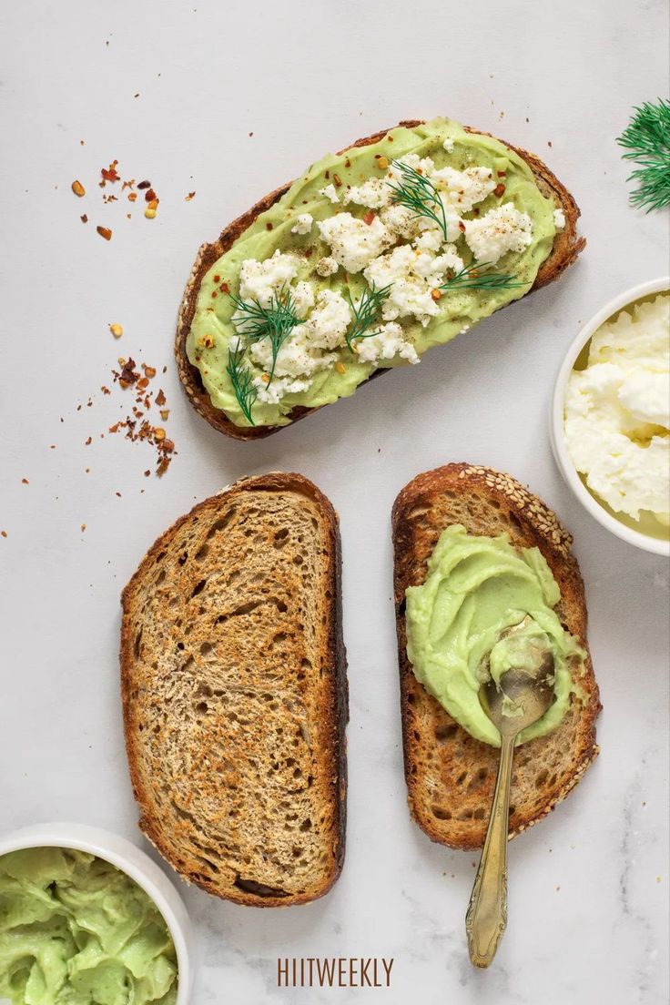 two pieces of bread with avocado spread on them