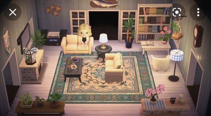 an aerial view of a living room with furniture and bookshelves on the walls