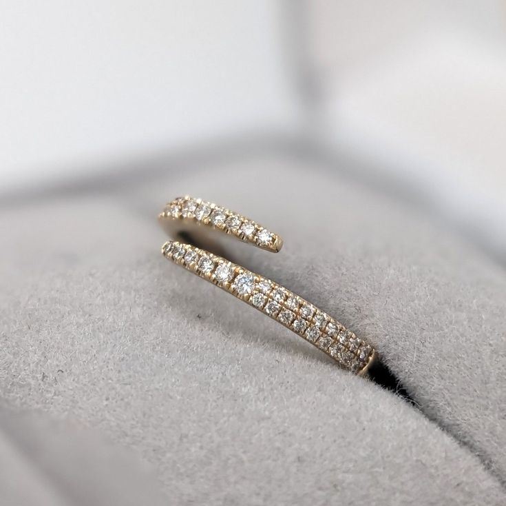 A stackable wrapped open band in 14k solid gold that can sit with your ring perfectly, or be worn on its own! Fine Jewelry Stackable Open Eternity Band, Stackable 14k Gold Open Ring Bands, Stackable 14k Gold Open Ring, Stackable White Gold Bands Open Ring, Stackable White Gold Open Ring Bands, Stackable White Gold Bands, Fine Jewelry Yellow Gold Open Band, Fine Jewelry Stackable Diamond Ring With Open Band, Fine Jewelry Diamond Ring With Open Band Stackable