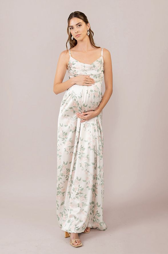 Model: Lindsey; Size: 4; Color: Soft Champagne Bouquet Elegant White Maternity Gown, Spring Maxi Dress For Mother Of The Bride, Elegant Spring Maternity Gown, Elegant Spring Maternity Dress, Elegant Sleeveless White Maternity Dress, Spring White Maternity Gown, White Maternity Gown For Spring, Elegant Spring Maternity Dress For Wedding, Elegant Maternity Dress With Floral Print