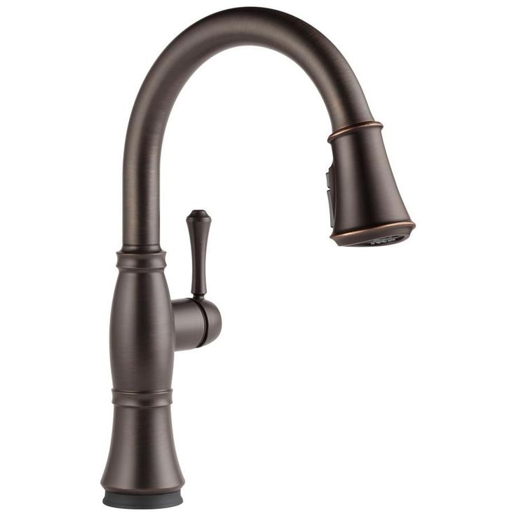 a kitchen faucet with an oil rubbed finish