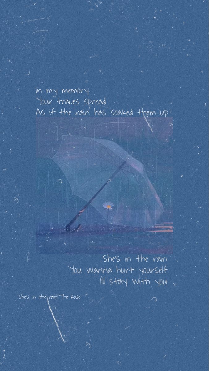 an umbrella sitting on top of a wet ground next to a blue sky with words written below it