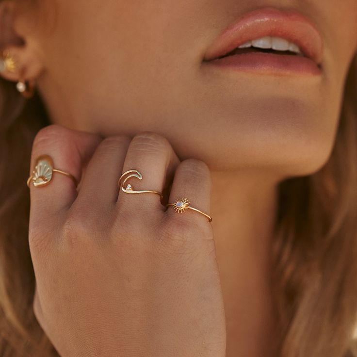 Introducing our first-ever Demi-Fine Collection. Handcrafted using hypoallergenic sterling silver and 18k gold plating, each piece is artisan-made and unique. Treat yourself or someone special to a keepsake that will live on and look stunning. Picture a sunset by the beach, the scent of ocean in the air, sand slipping through your fingers. Now imagine how much more magical it would be when wearing our Diamond Wave Ring. Crafted with an organically hammered band in sterling silver or 18K gold pla Sun Ring, Pura Vida Bracelets, Hammered Band, Wave Ring, Moonstone Earrings, By The Beach, Demi Fine Jewelry, Diamond Clarity, Silver Diamonds