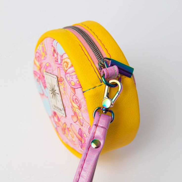 This wristlet is a cute grab-and-go bag with space for cards, keys, and some lip balm. It can also be used in your bag as a change purse or mini cosmetic bag. It is also an excellent gift for a kiddo to store their treasures! Thinking about giving a gift card? You can store it in this cute wristlet and gift it along with the gift card! Approx finished size: 5” W x 5” H x 2” D No 2 bags are the same! You may see the same fabric used in my shop in other products, but a custom-made bag will not be recreated! Photos are examples of past work. *CUSTOM ORDER PROCESS* Have a vision for your bag? Build it along with me! When you place your order, you will receive a message from me asking for a few details for your bag creation. We will communicate throughout the process so you can choose your favo Coin Purse With Zipper Closure As Gift, Handheld Coin Purse With Zipper Closure As Gift, Handheld Pouch With Zipper Closure As Gift, Trendy Multicolor Coin Purse As Gift, Cute Adjustable Bag For Gift, Handheld Pouch With Adjustable Strap For Gift, Trendy Pouch With Adjustable Strap As Gift, Handheld Wristlet With Removable Pouch As Gift, Trendy Multicolor Coin Purse Gift