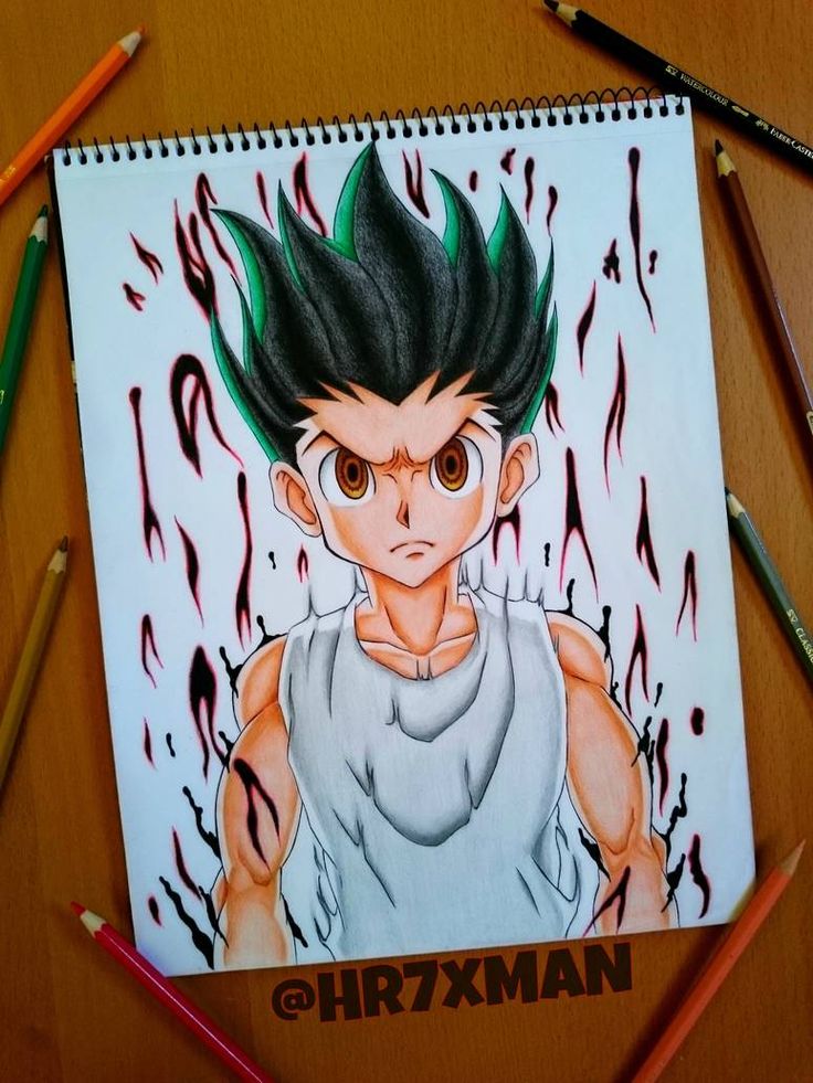 a drawing of an anime character with black hair and green eyes, surrounded by colored pencils