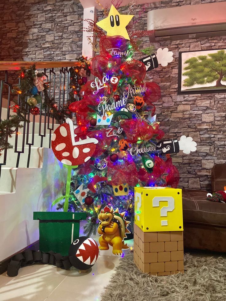 the christmas tree is decorated with mario and luigi's name on it, along with other decorations