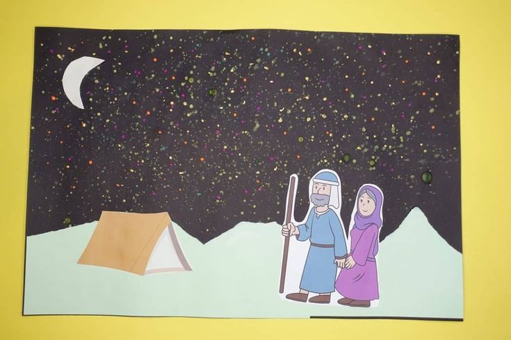 an image of a man and woman standing in front of a tent under the stars