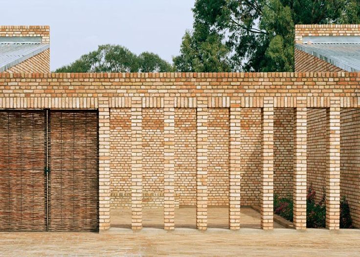 an image of a brick building with two doors