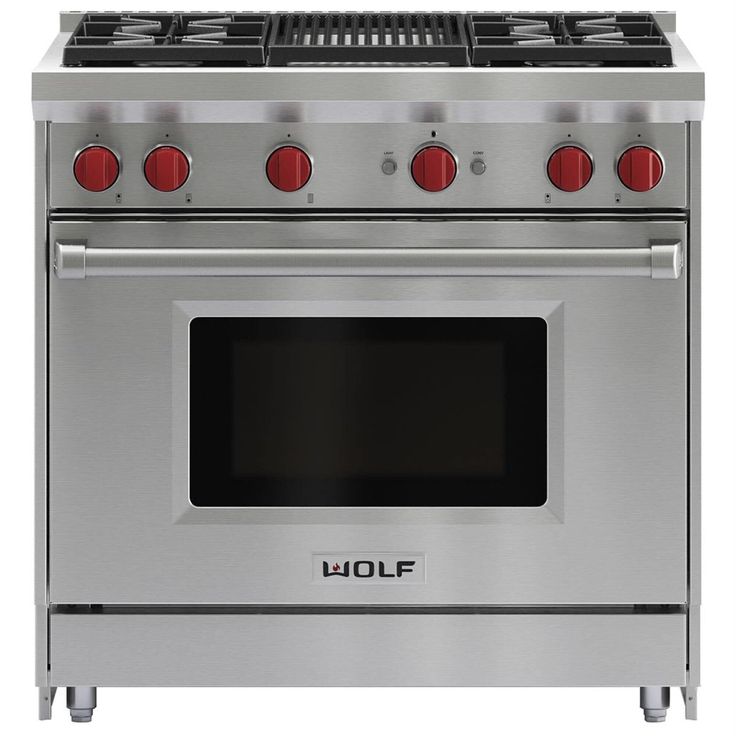 a stainless steel stove with four burners and red knobs on the front door