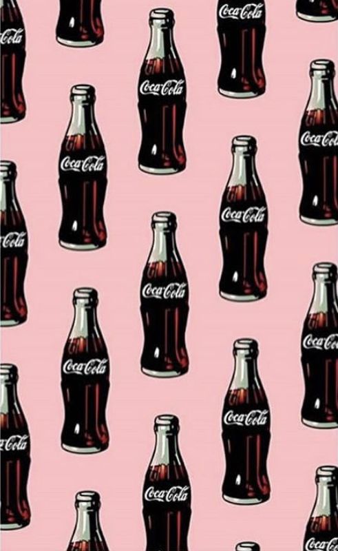 coca - cola bottles are shown on a pink background