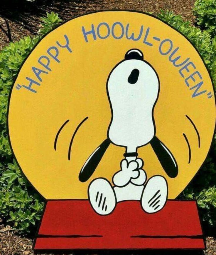 a sign that says happy hooli - oeuen with a cartoon dog on it