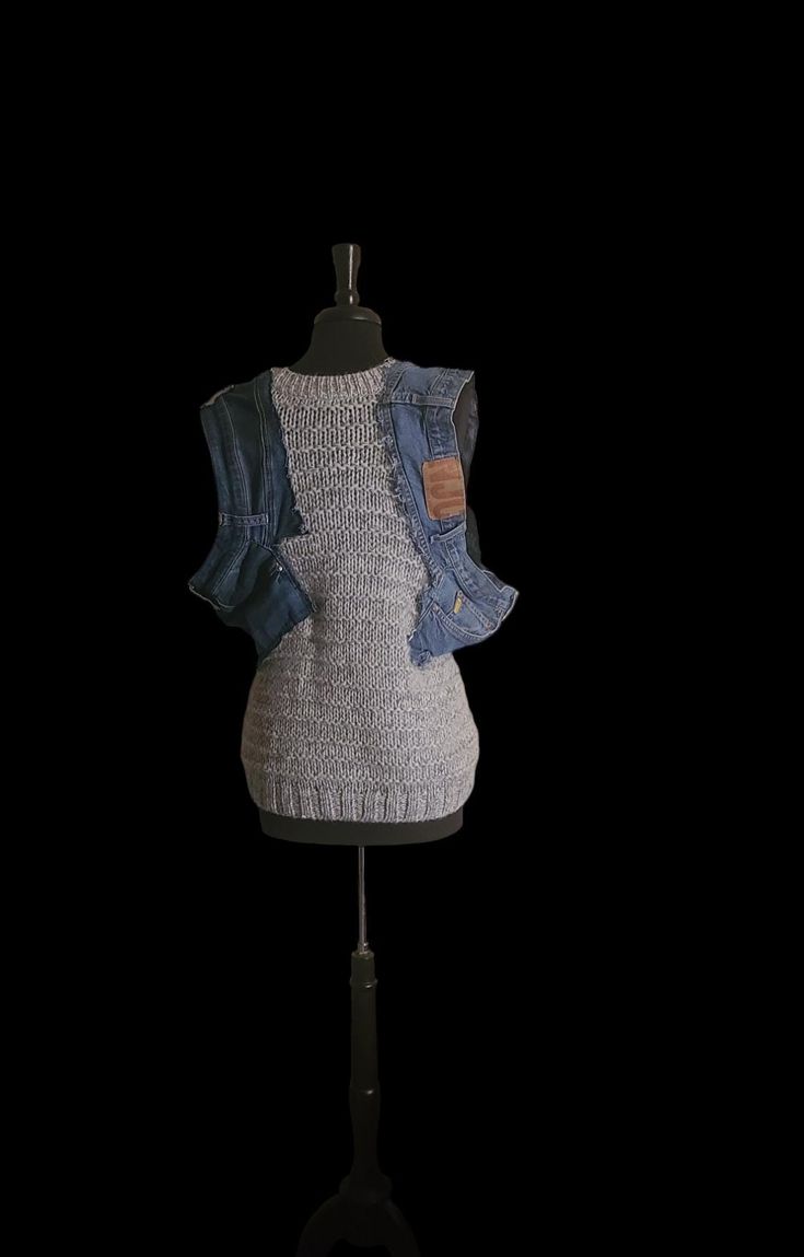 Set up your style with this mixed up sweater vest. It features a unique denim sleeved detail and it boast with the coziness of wool Sweater material that will keep you warm all day. The denim adds a touch of edge. Slay your fashion game with this must have sweater! Size: small to large Knitted Cotton Vest For Fall, Knitted Cotton Sweater Vest For Layering, Cotton Knitted Sweater Vest For Layering, Casual Denim Vest For Fall Layering, Fall Cotton Stretch Sweater Vest, Fall Layering Denim Cotton Vest, Fall Layering Cotton Denim Vest, Fall Layering Denim Vest In Cotton, Trendy Cotton Sweater Vest For Layering