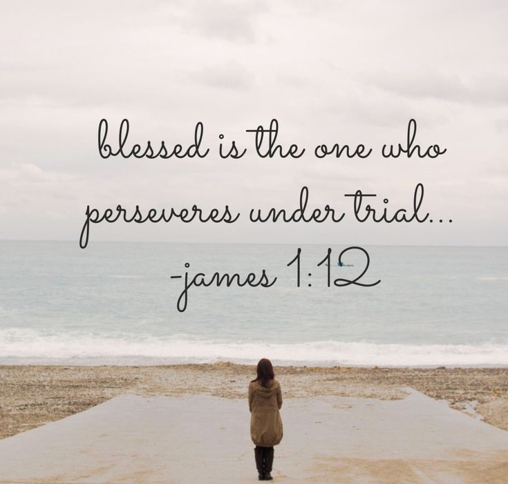 a woman standing on top of a sandy beach next to the ocean with a bible verse above her