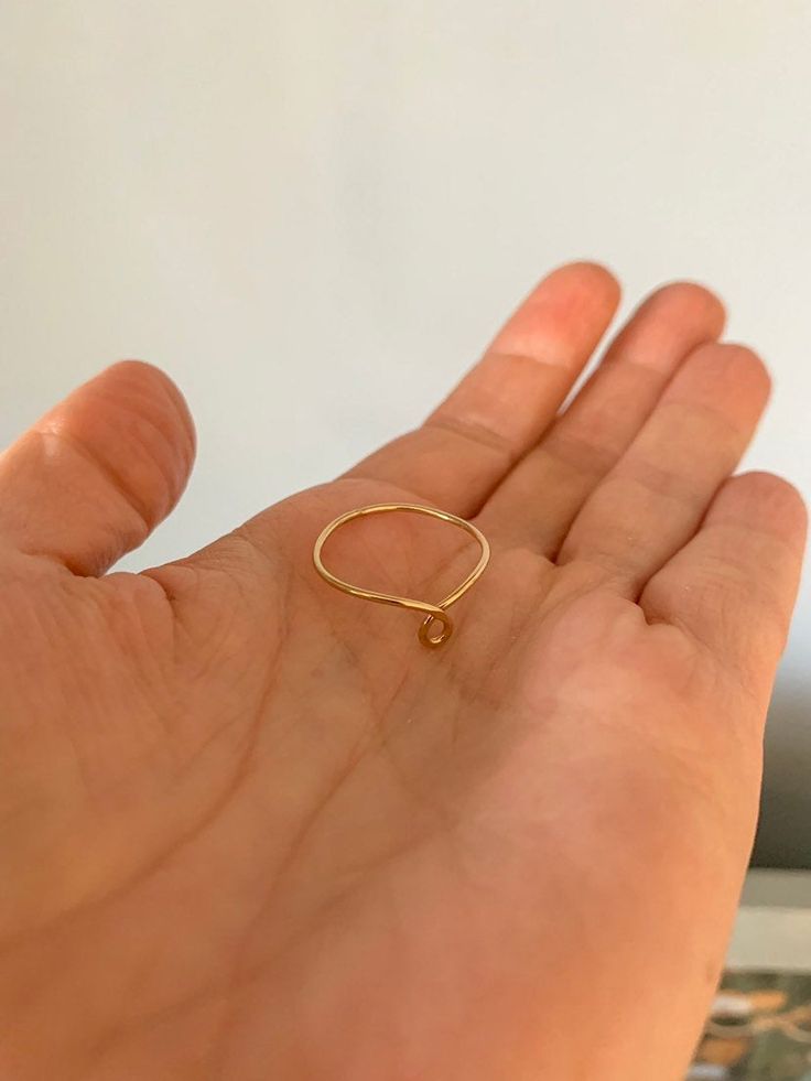 "Knot ring, Gold Ring, Silver Ring, Stacking Ring, Dainty Ring This amazing ring is so cute and can be worn everyday by itself or stacked with other rings! It comes in 14k Gold Fill, Rose Gold Fill, or Sterling Silver. Choose your metal and ring size at checkout. I can make any size you need from small to larger sizes! If you don't see your size as an option, select the option \"other\" and type it in. Please message me with any questions. Shop the stacking look by adding these: https://www.etsy