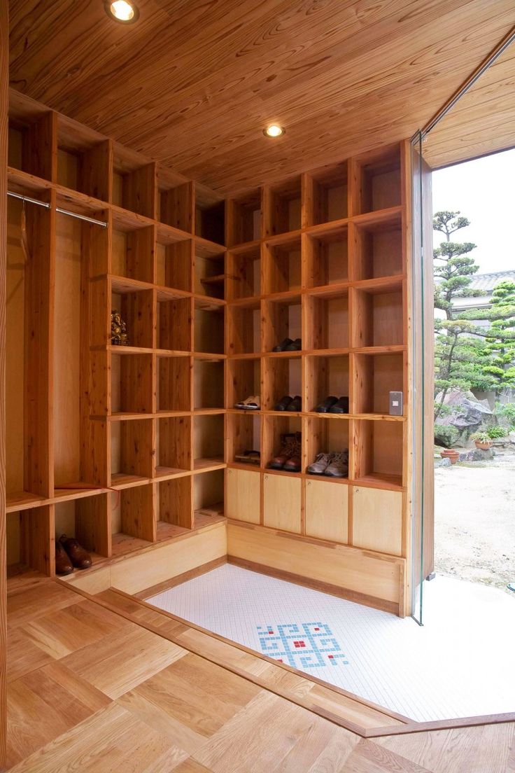 an image of a room with wooden shelves