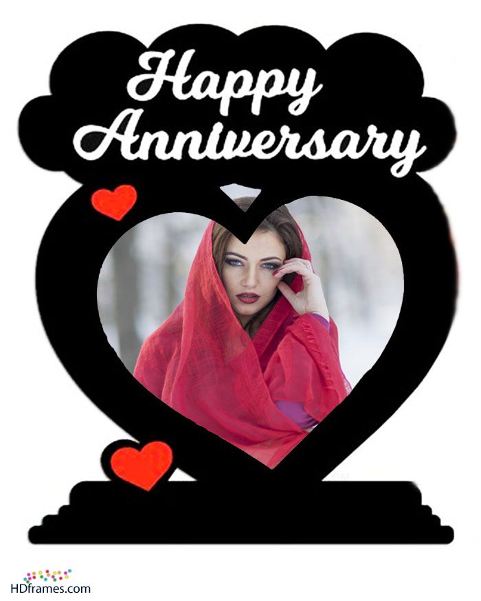 a heart shaped frame with an image of a woman in red shawl holding a cell phone