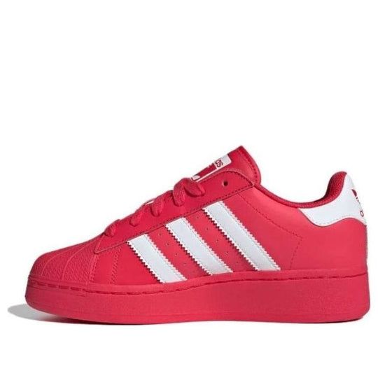 (WMNS) adidas Superstar XLG 'Red' IE2986 Adidas Skate Shoes For Sports With Round Toe, Red Sneakers With Rubber Sole For Sports, Red Sneakers With Rubber Sole For Sports Events, Adidas Sneakers For Sports With Round Toe, Sneakers With Three Stripes For Light Sports, Adidas Skate Shoes For Sports, Pink Low-top Sneakers For Sports Events, Red Round Toe Sneakers, Sporty Pink Sneakers For Sports Events