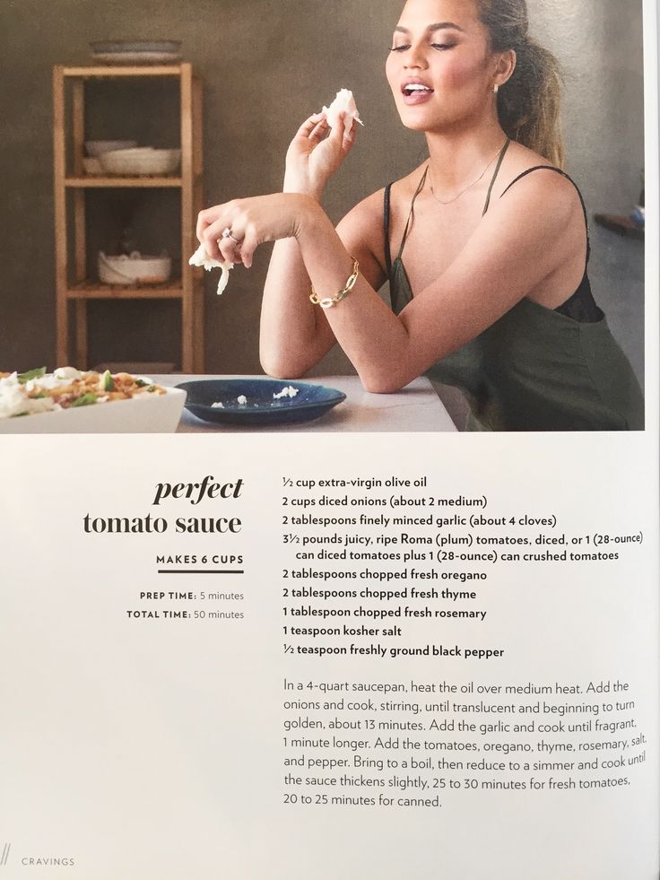 an article in the magazine shows a woman eating food from a bowl and holding a piece of bread