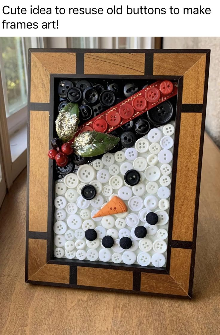 an image of a snowman made out of buttons on a wooden frame with text that reads, cute idea to reuse old buttons to make frames art