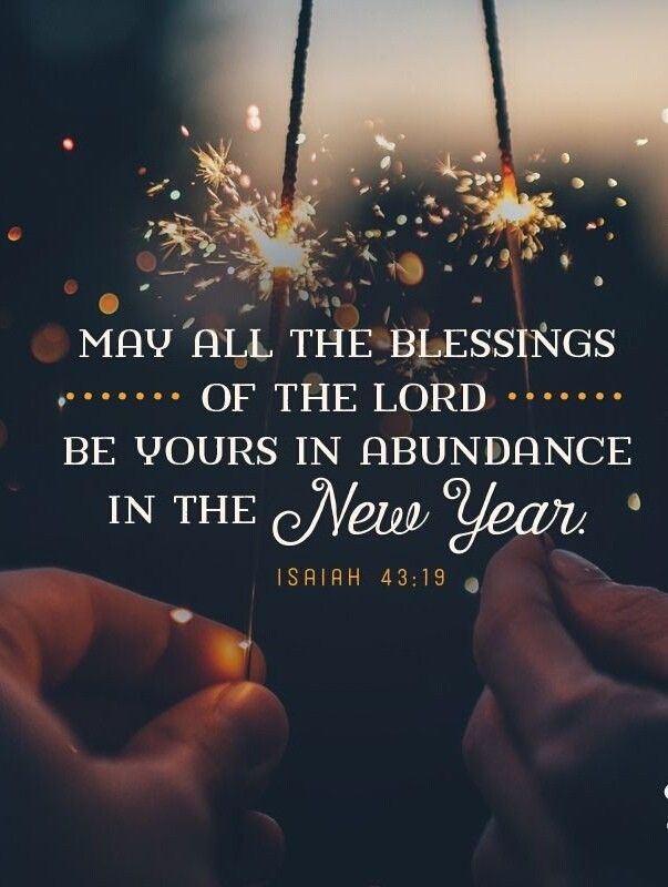 two hands holding sparklers with the words, may all the blessings of the lord be yours in abundance in the new year