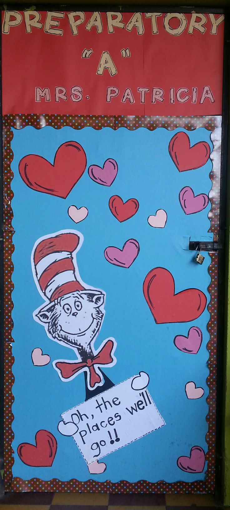 a dr seuss door decorated with hearts and an image of the cat in the hat