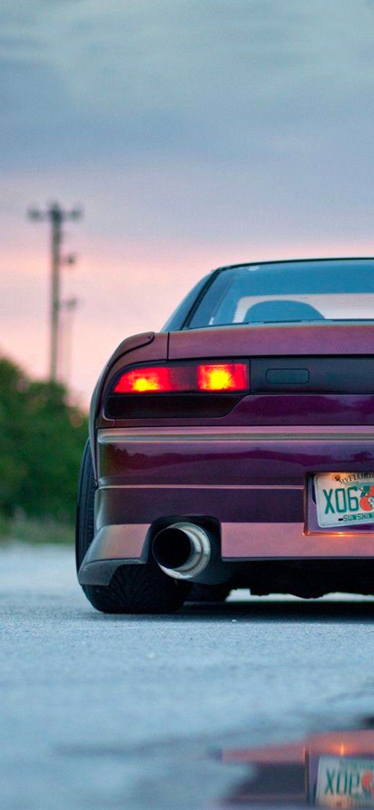 the back end of a purple sports car