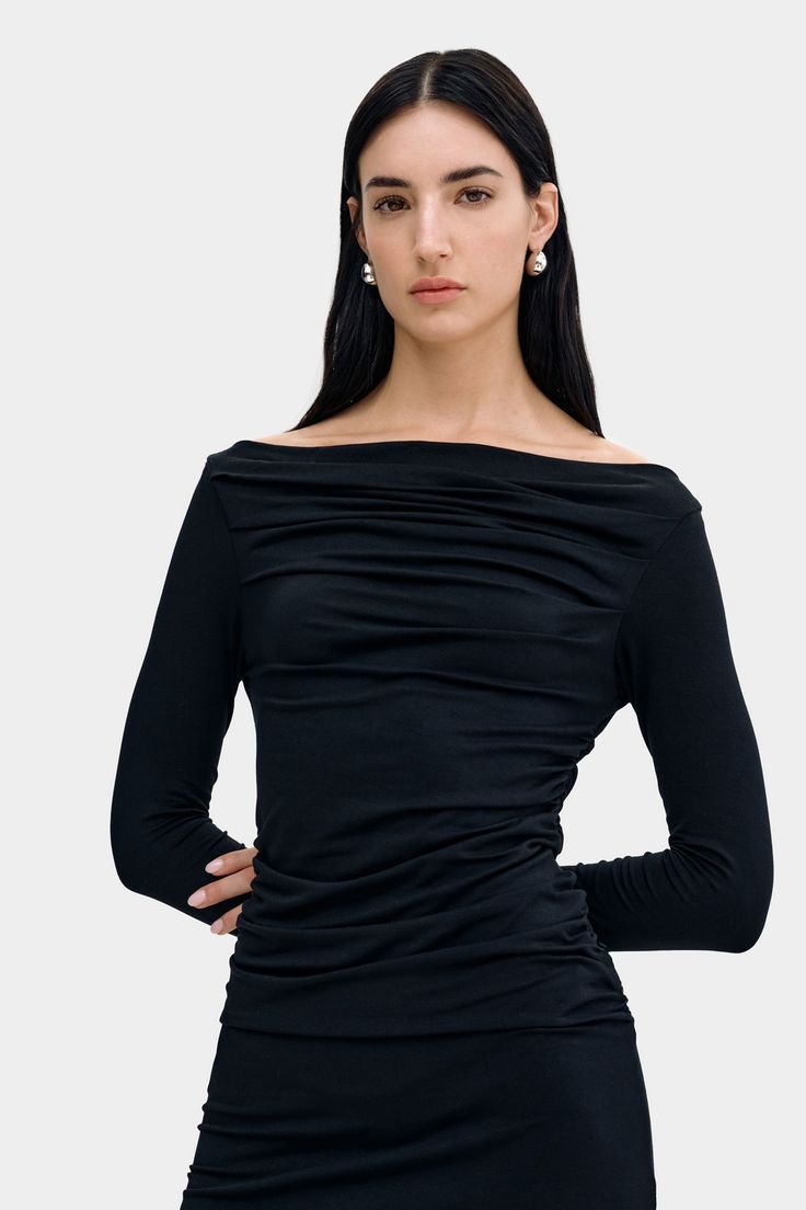 Introducing our best-selling Cooper Top’s elegant sister: the Cooper Dress. She’s crafted from soft, high-stretch and sustainable European jersey that drapes beautifully throughout her extra-long sleeves and fitted bodice before falling into a straight-cut skirt. Wear her boat neckline on the shoulder for casual charm or slip it off the shoulder for instant evening allure. | Emily is 5'9.5" (177 cm) tall, wearing size XS. Total length from the underarm is approximately 40.5" (103 cm). Sleeve len Cooper Dress, Caterina Dress, Essential Accessories, Black Drapes, Minimalist Women, Easy Day, Extra Long Sleeves, The A Team, Boat Neckline