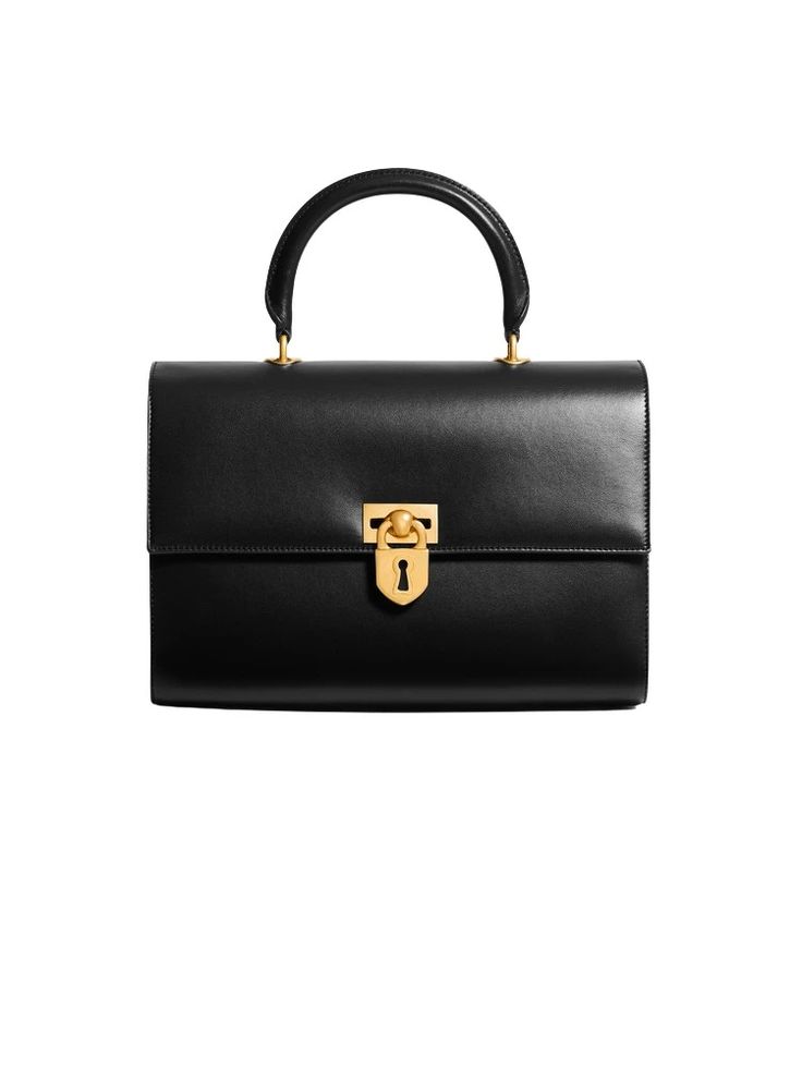 [vc_row][vc_column width=”1/3″][vc_column_text text_larger=”no”] Schiaparelli Schiaparelli Large Secret Bag A bag crafted from smooth black lambskin. It is secured with a gilded brass toggle clasp in the form of a Padlock with black enamel detailing. The bag is carried by hand with a top handle fastened with gilded brass fasteners. Removable leather shoulder strap.   Height 21cm, Width 30,5cm, Depth 7cm. Schiaparelli Large Secret Bag has been a staple of the fashion world Brass Fasteners, Leopard Print Coat, Elsa Schiaparelli, Stylish Celebrities, Bags Shop, Old Hollywood Glamour, Fashion World, Inspired Dress, Toggle Clasp