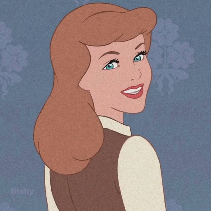 an animated image of a woman with brown hair and blue eyes, smiling at the camera