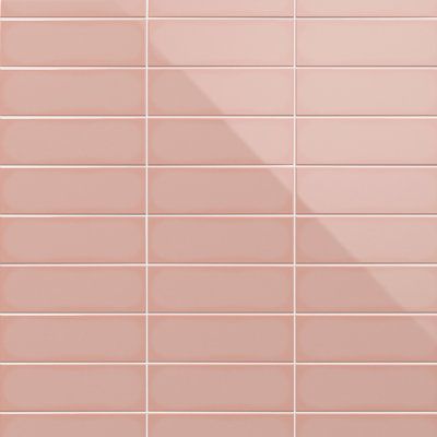 a pink tiled wall with white tiles on it