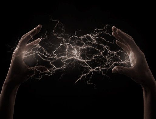 two hands holding out their palms with lightning in the background