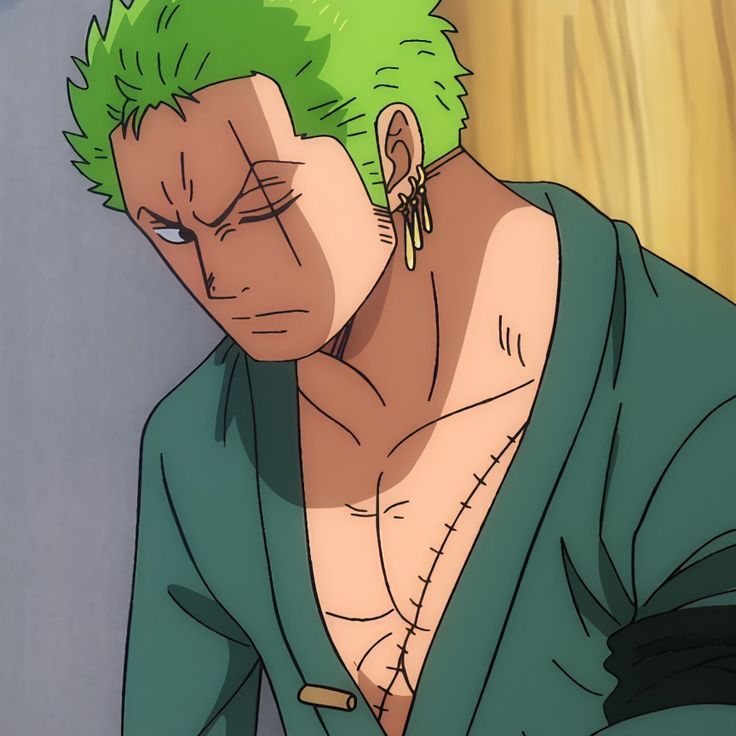 an anime character with green hair and piercings on his ears looking down at something