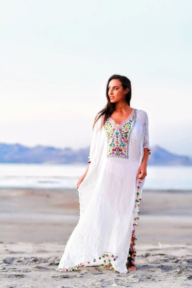 "Boho Wedding Dress, Kaftan Dress, White Maxi Dress Introducing our new range of pristine whites - vagabond p:s - This dress from BaublesNBloom was recently on the runway at Paris fashion week ! Collection AW19 Evoke a wanderlust vibe with our free spirited, beachy bohemian range which has a way of making every woman feel beautiful, and exotic. We wanted to design something elegant yet comfortable for any occassion. These embroidered kaftans inspired by an ancient folk art of India, feature trib Long White Maxi Dress, Long Kaftan Dress, Beach White Dress, Wedding Dresses Hippie, White Lace Wedding Dress, Dress Kaftan, Boho Trends, White Boho Dress, White Maxi Dress