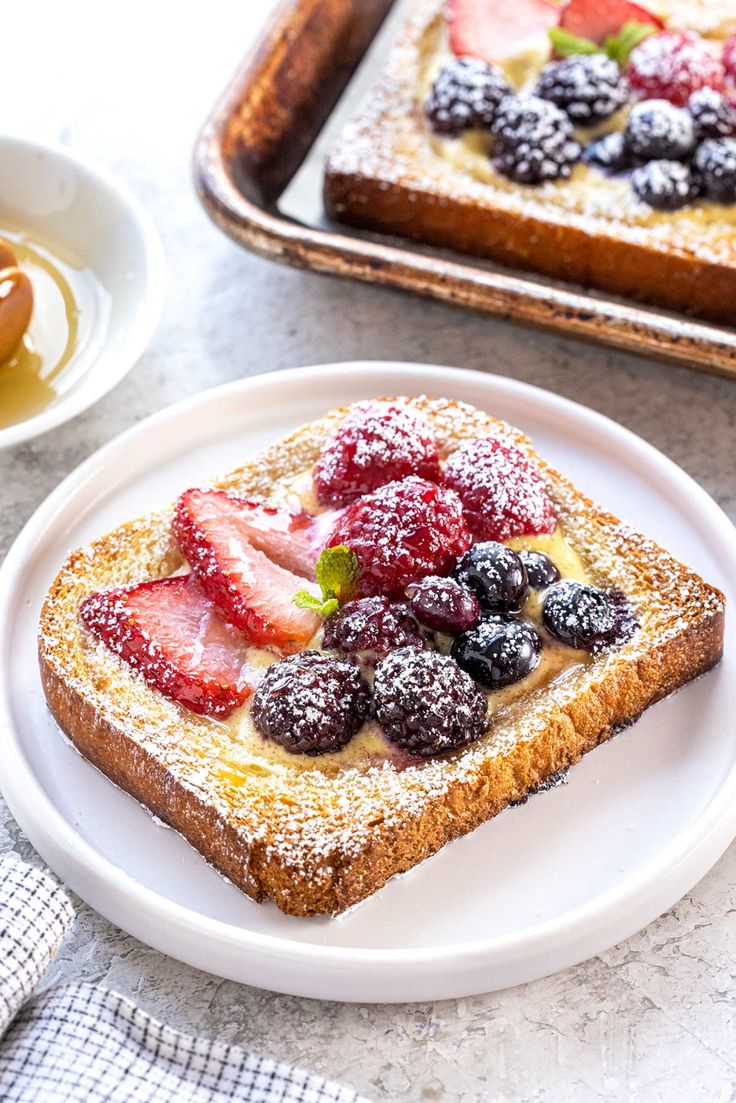 a piece of french toast with fruit on top