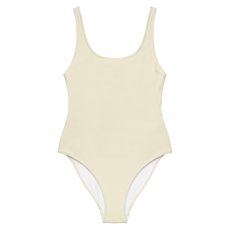 Embrace and showcase your best features with this low back one piece swimsuit, perfect for all body types. The smooth fabric and flattering design will make you feel confident and stylish whether you're lounging by the beach or taking a dip in the pool. Color Match - Perfect for all skin tones• 82% Polyester, 18% Spandex• Fabric weight: 6.78 oz/yd² (230 g/m²), weight may vary by 5%• Chlorine-resistant fabric• Cheeky fit with a scoop neckline and a low scoop back• Zig-zag stitching• Double-layer White Low Back Swimwear For Swimming, One-piece Bodysuit For Poolside, Cream Fitted One-piece Swimwear, Fitted Cream One-piece Swimwear, Fitted One-piece Cream Swimwear, Cream Fitted Sleeveless Swimwear, White Fitted Swimwear With Low Back, Cream Sleeveless Swimwear For Beach, Fitted Cream Swimwear For Swimming