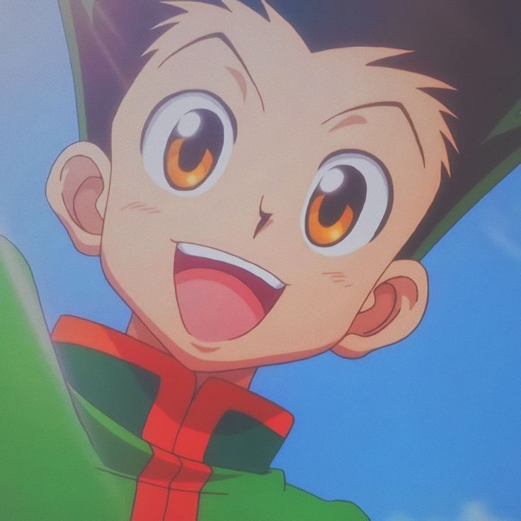 an animated image of a young boy with big eyes and brown hair smiling at the camera