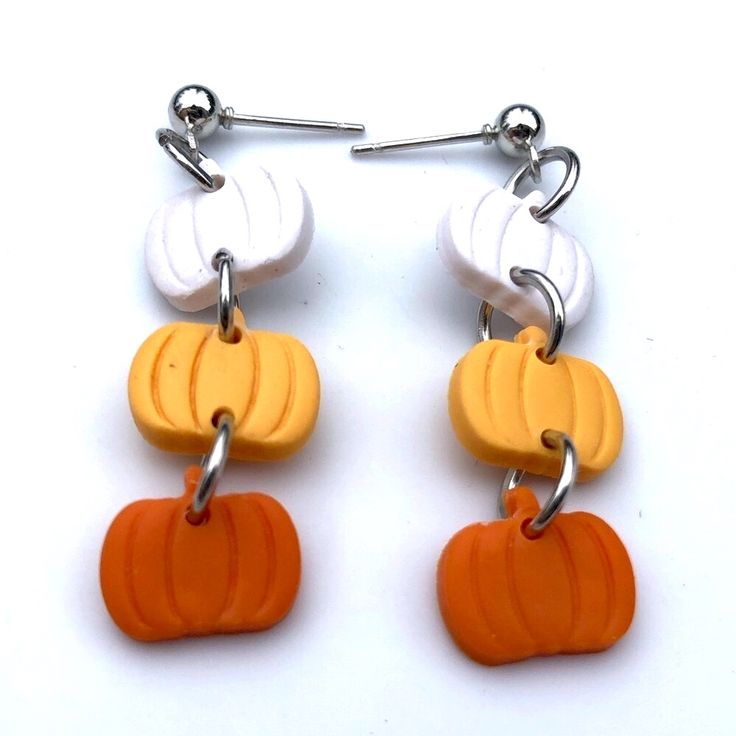 I Handcrafted These Stacked Pumpkin Earrings Out Of Polymer Clay And They Are Brand New And Fresh Out Of The Oven. Lightweight, Comfortable Dangle Earrings With Ball Posts Feature A Row Of Little Pumpkins In Candy Corn Shades Of White, Yellow And Orange. These Are Nice For People Who Like Their Jewelry On The Dainty Side While Still Making A Statement. There Are Some Minor Imperfections That Add Character To The Handmade Design And Make Them Truly One Of A Kind. Great For Fall, Halloween Or Any Fall Earrings Clay, Guitar Patterns, Vintage Gold Earrings, Boho Hoop Earrings, Butterfly Earrings Gold, Moon And Star Earrings, Flat Back Earrings, Pumpkin Earrings, Geometric Studs