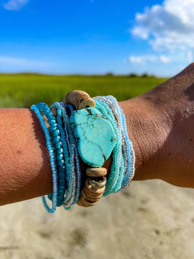 Stacked Single Bracelet | Tides Adjustable Stacked Stretch Bracelet For Beach, Adjustable Stacked Bracelets For Beach, Stacked Adjustable Beaded Bracelets, Stackable Heishi Beads Bracelets For Beach, Bohemian Stacked Beaded Bracelets With Round Beads, Stacked Bohemian Beaded Bracelets, Bohemian Stacked Round Beaded Bracelets, Adjustable Stacked Beaded Bracelets With Round Beads, Bohemian Stacked Beaded Bracelets