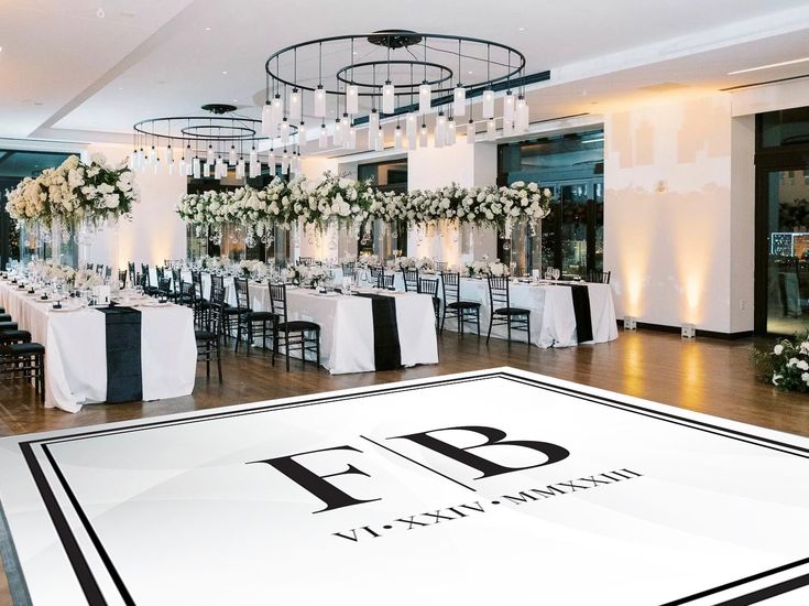 an elegant wedding reception with white and black decor