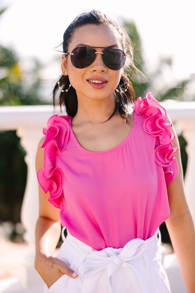 Introducing the Do Your Best Ruffled Blouse - the perfect addition to your summer wardrobe! With its ultra-feminine pink hue and ruffled detailing, this comfy-cute tank will have you looking sweet and chic! This blouse features a scoop neckline, ruffled sleeves, and a button keyhole back.  Material has no amount of stretch.Cindy is wearing the small. Feminine Ruffled Blouse For The Beach, Pink Ruffle Sleeve Tops For Summer, Feminine Beach Blouse With Ruffles, Feminine Ruffle Hem Tank Top, Trendy Pink Ruffled Tops, Chic Pink Ruffled Tank Top, Feminine Summer Tank Top With Ruffle Hem, Pink Ruffled Straps Tank Top, Spring Feminine Scoop Neck Tank Top