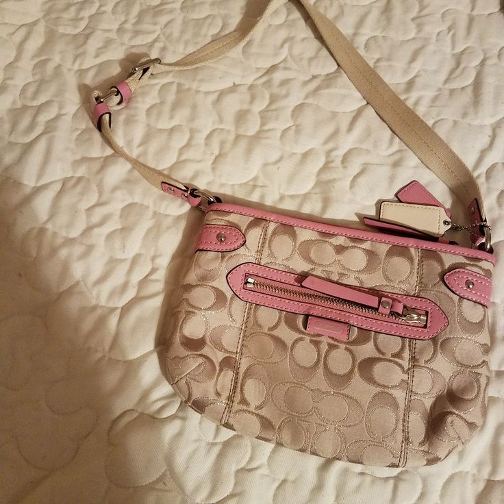 Coach Crossbody Pink Snd Tan Never Used Measures 9.5x7.Zip Top Pocket Inside.Pocket In Back Zip Pocket In Front.Adjustable Handle Pink Coach Bag With Zipper Closure, Coach Crossbody Bag With Pockets, Bags Coach, 2000s Fashion Outfits, Coach Crossbody, Fashionista Clothes, Pretty Bags, 2000s Fashion, Hand Bags