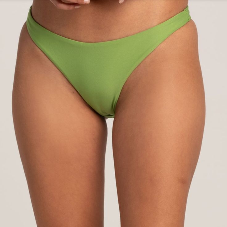 Nwt! Volcom Simply Seamless Tiny Bikini Bottoms Green Large Skimpy Cheeky Coverage Matching Top Available! Trendy Seamless Bottoms For The Beach, Trendy Seamless Solid Color Swimwear, Trendy Solid Color Seamless Swimwear, Summer Seamless Swimwear Brief, Trendy Solid Swimwear With Seamless Construction, Trendy Solid Color Swimwear With Seamless Construction, Trendy Solid Seamless Swimwear, Green Seamless Swimwear For Swimming, Green Seamless Bottoms For Summer