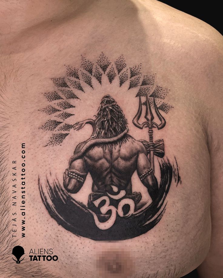 the back of a man's chest with an omen symbol tattoo on it